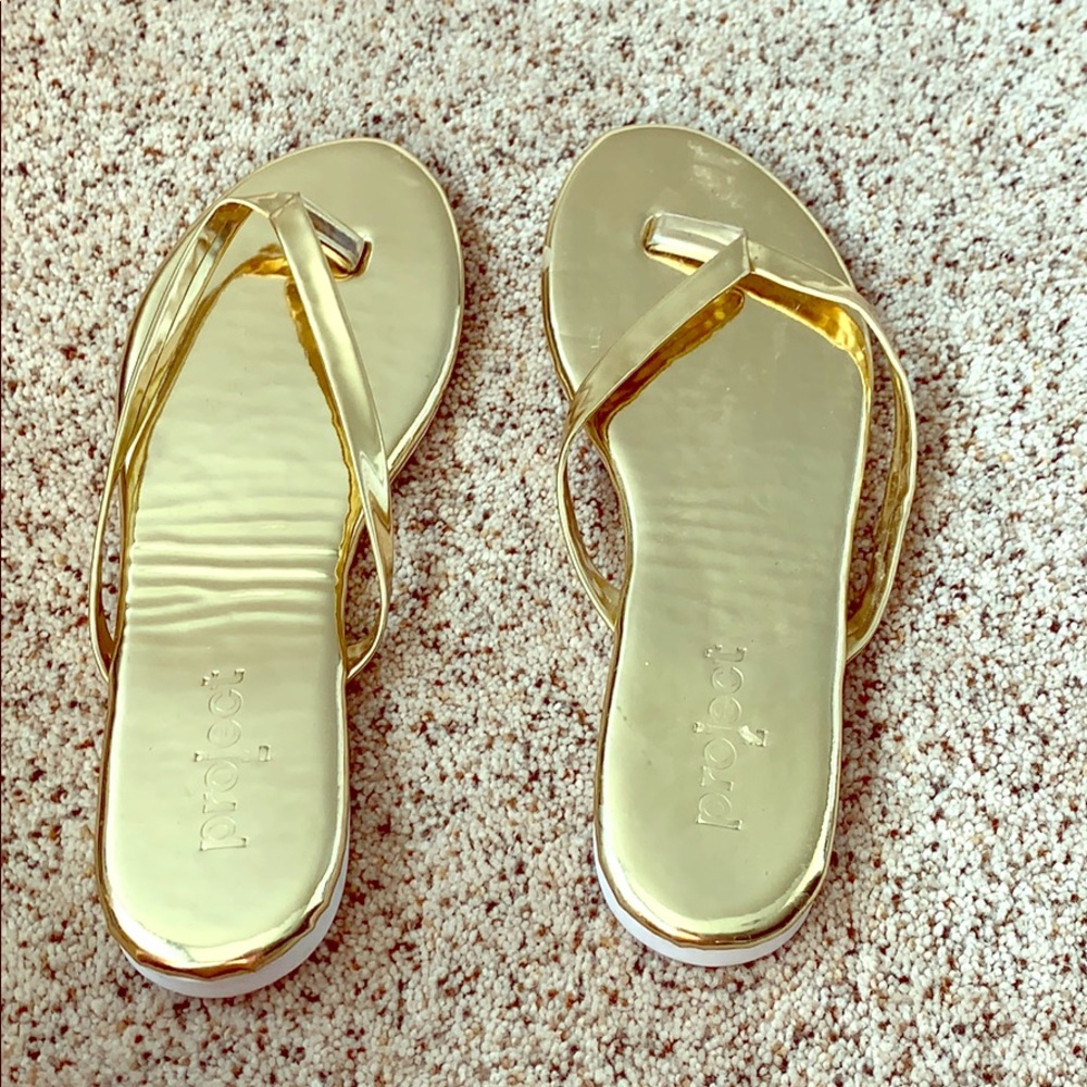Gold flip flops